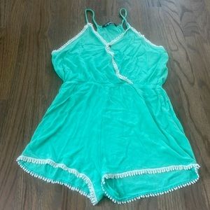 Cute teal green romper.